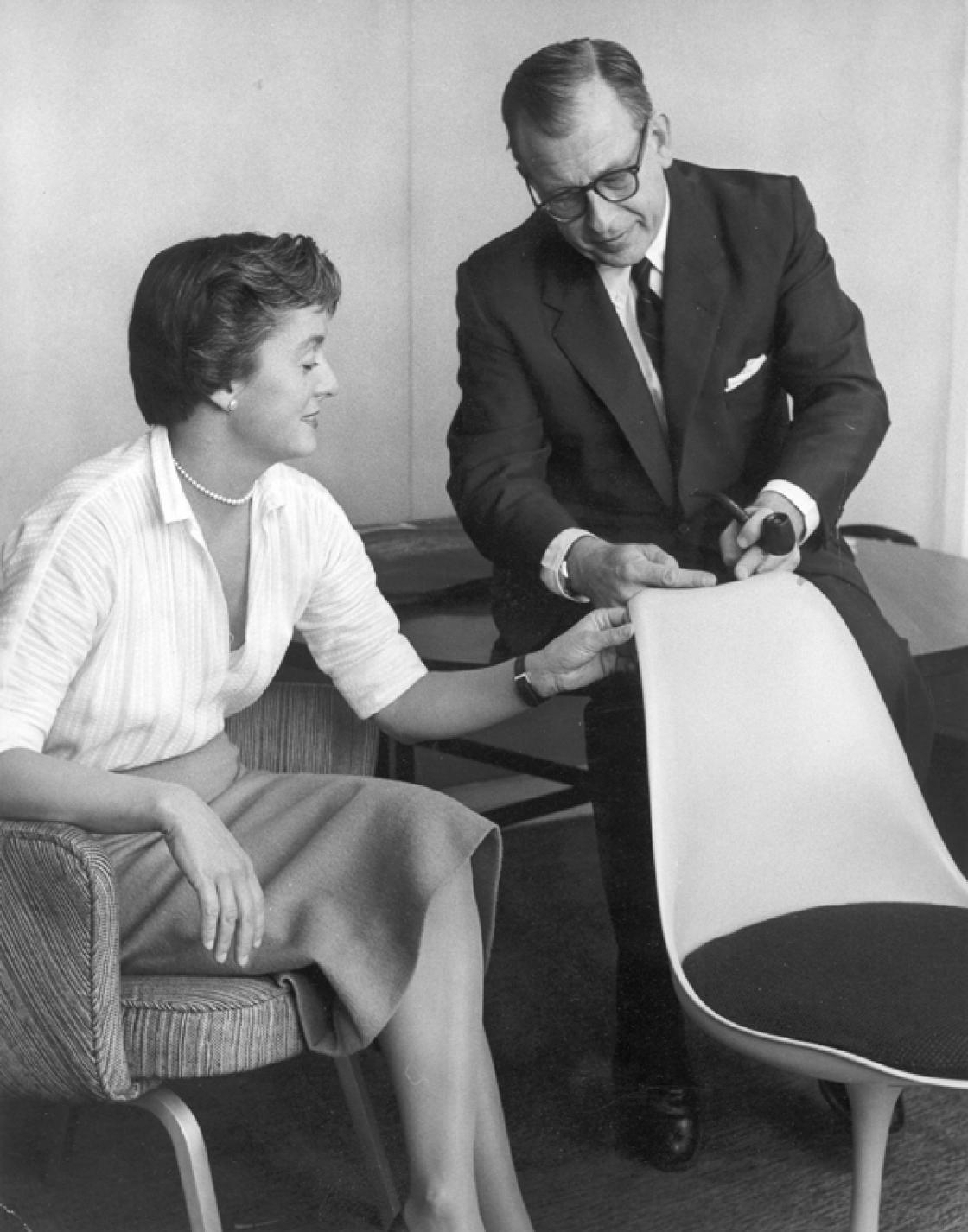 Publicity photo of Florence Schust Knoll and Eero Sarrinen with Saarinen's Pedestal Chair. 1956. Photographer: Scott Hyde. Courtesy of Cranbrook Archives.