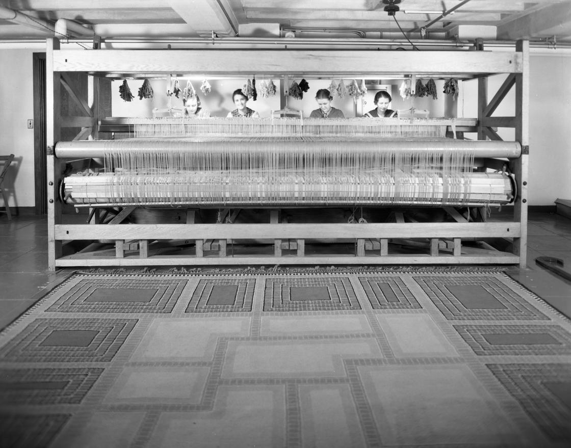 Studio Loja Saarinen weavers Elizabeth Edmark, Marie Bexell, Peggy Broberg, and Gerda Nyberg at a twelve foot loom, c. 1931. Copyright Cranbrook Archives.
