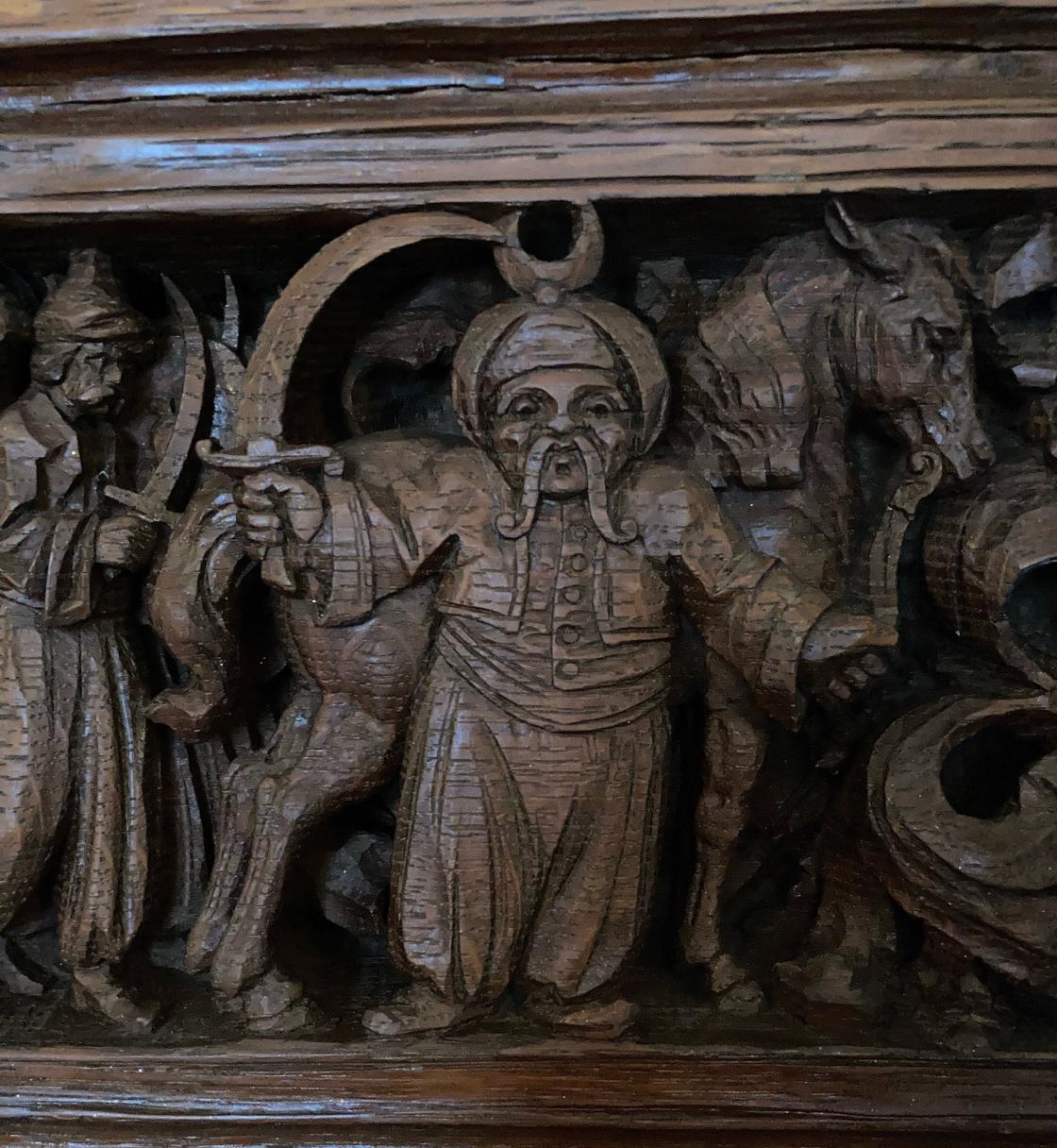 Photograph of a detail on the over mantle in Cranbrook House's library