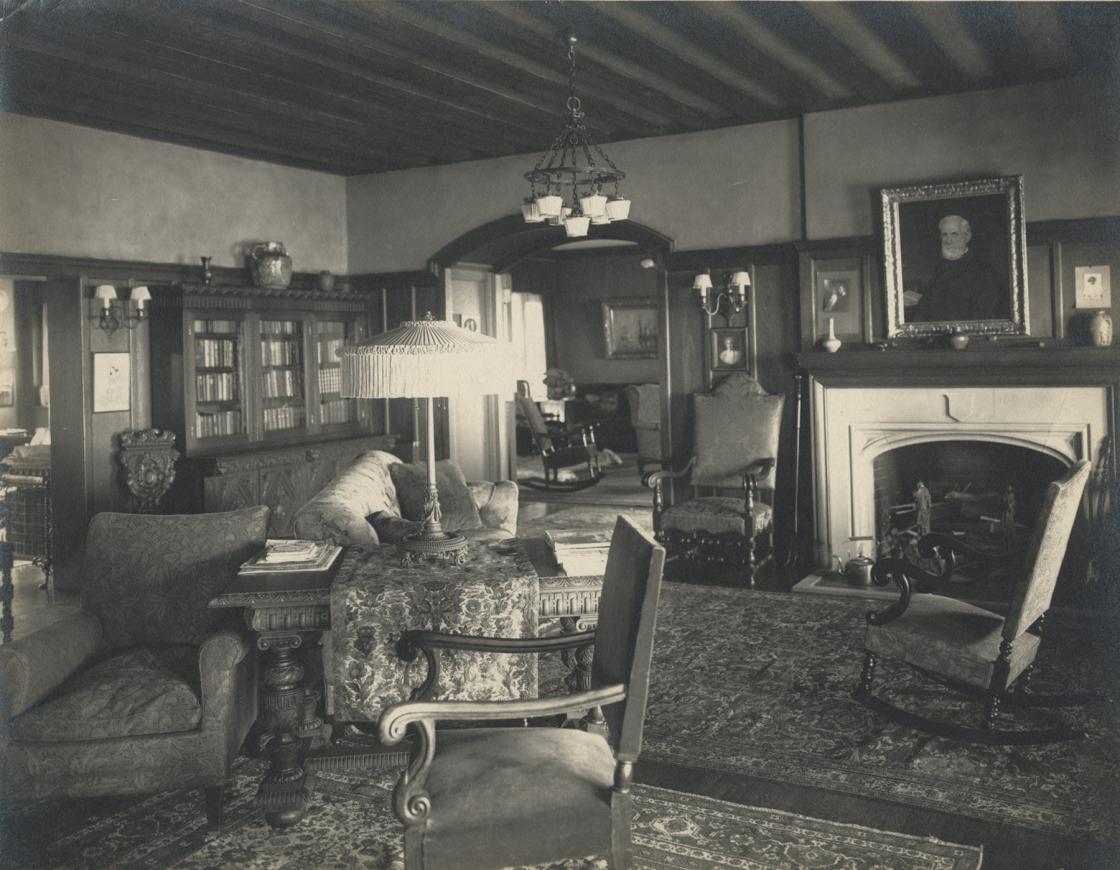 Cranbrook House Reception Hall, circa 1916. Photography Collection of Cranbrook Archives (E452). The portrait of Henry Booth by Robert J. Wickenden is hanging over the fireplace.